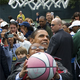 Illustration for article titled President Plays Hoops; Wins Polls